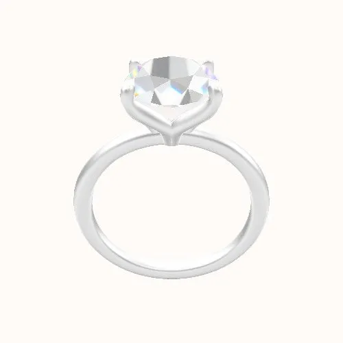 Classic Solitaire Engagement Ring With Petal Four Prong Head