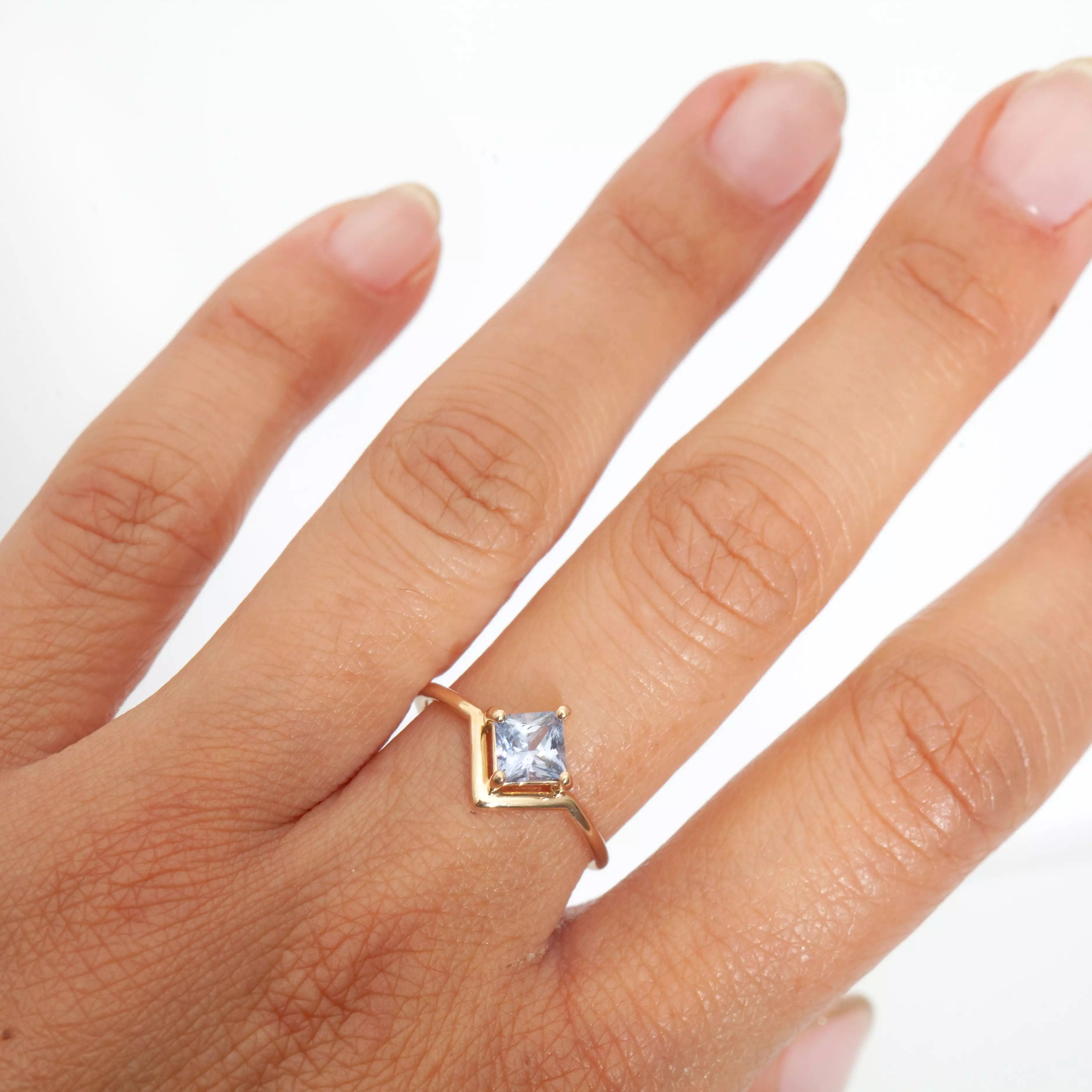 Nestled Princess Cut Sapphire Ring